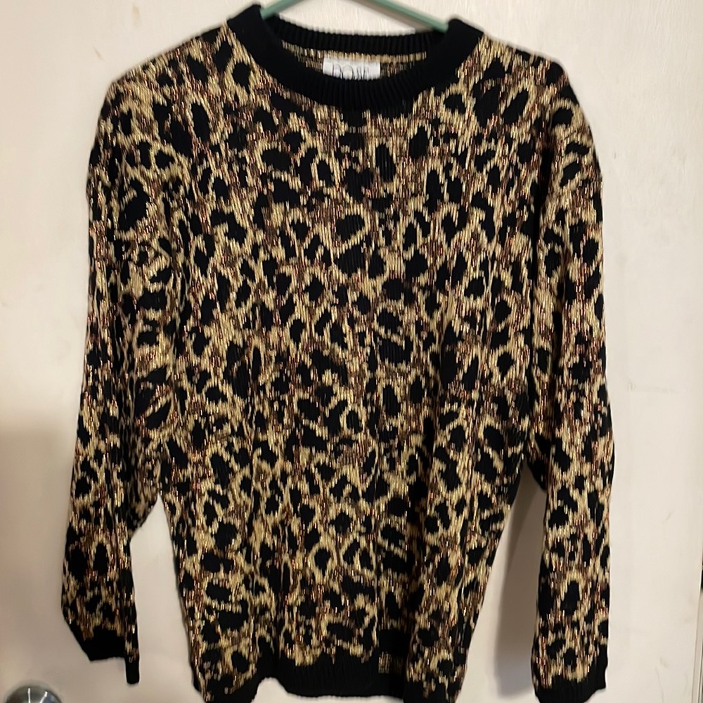 Woman’s rose leopard sweater size medium